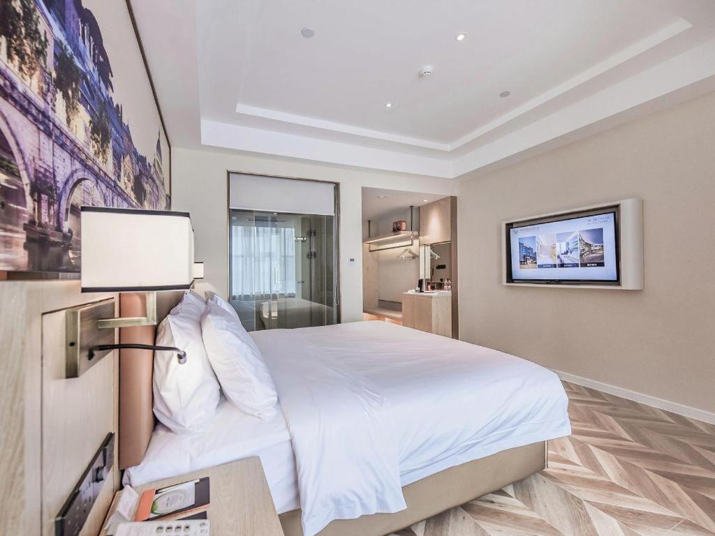 Vienna Hotel Sichuan Hejiang Yangtze River Bridge Лучжоу Экстерьер фото