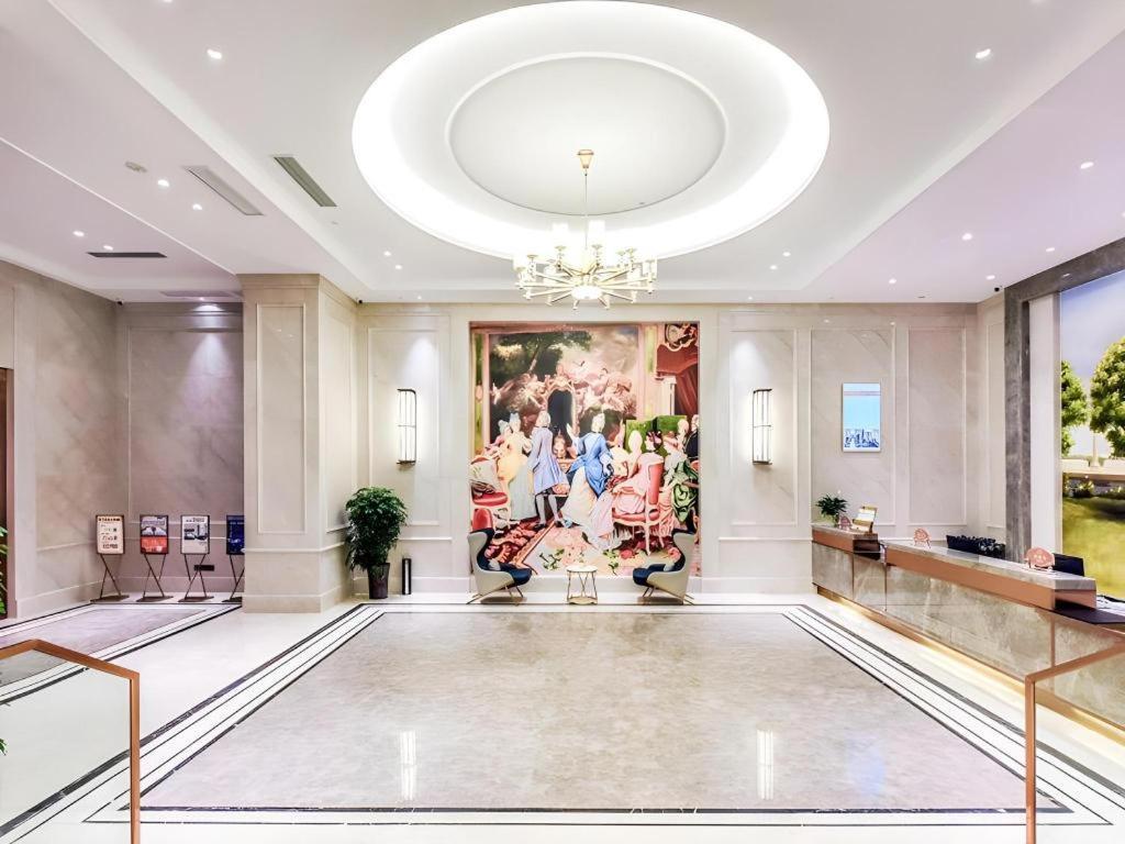 Vienna Hotel Sichuan Hejiang Yangtze River Bridge Лучжоу Экстерьер фото
